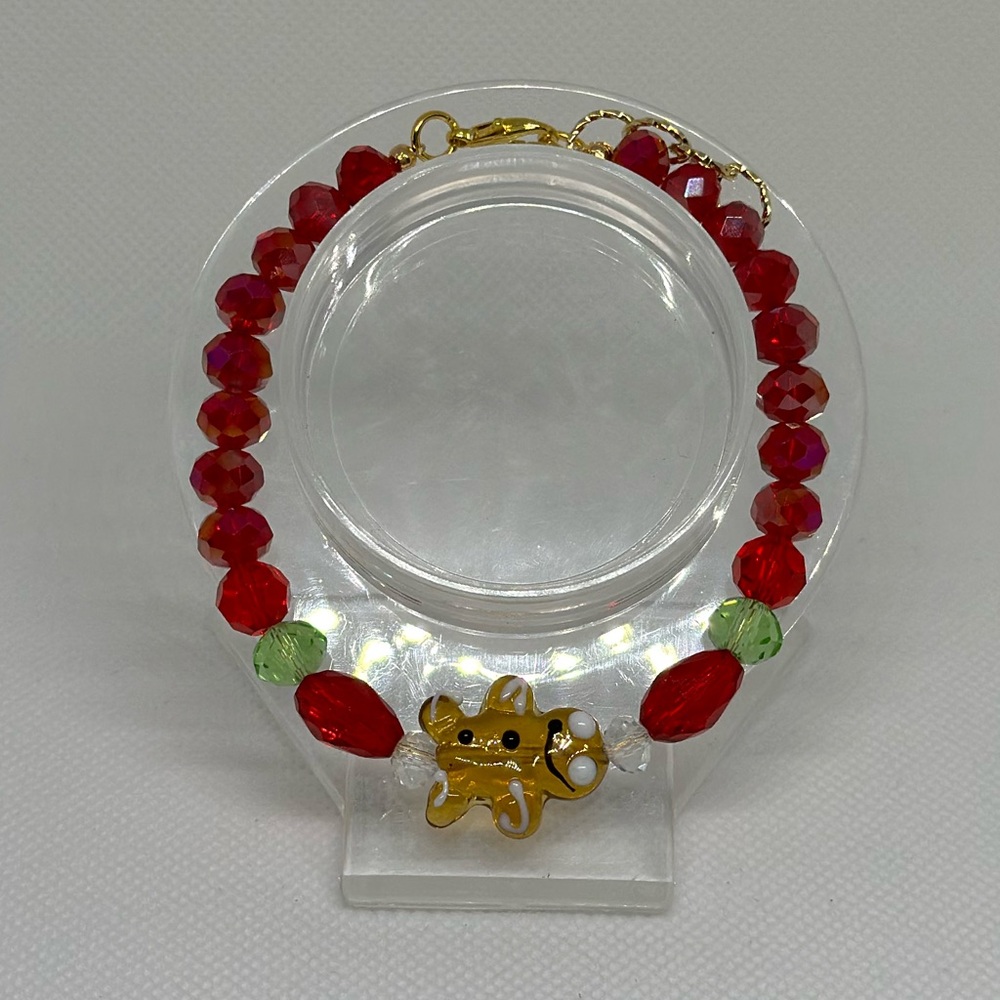 Handmade Gold Wire Bracelet with a Gingerbread Man Bead